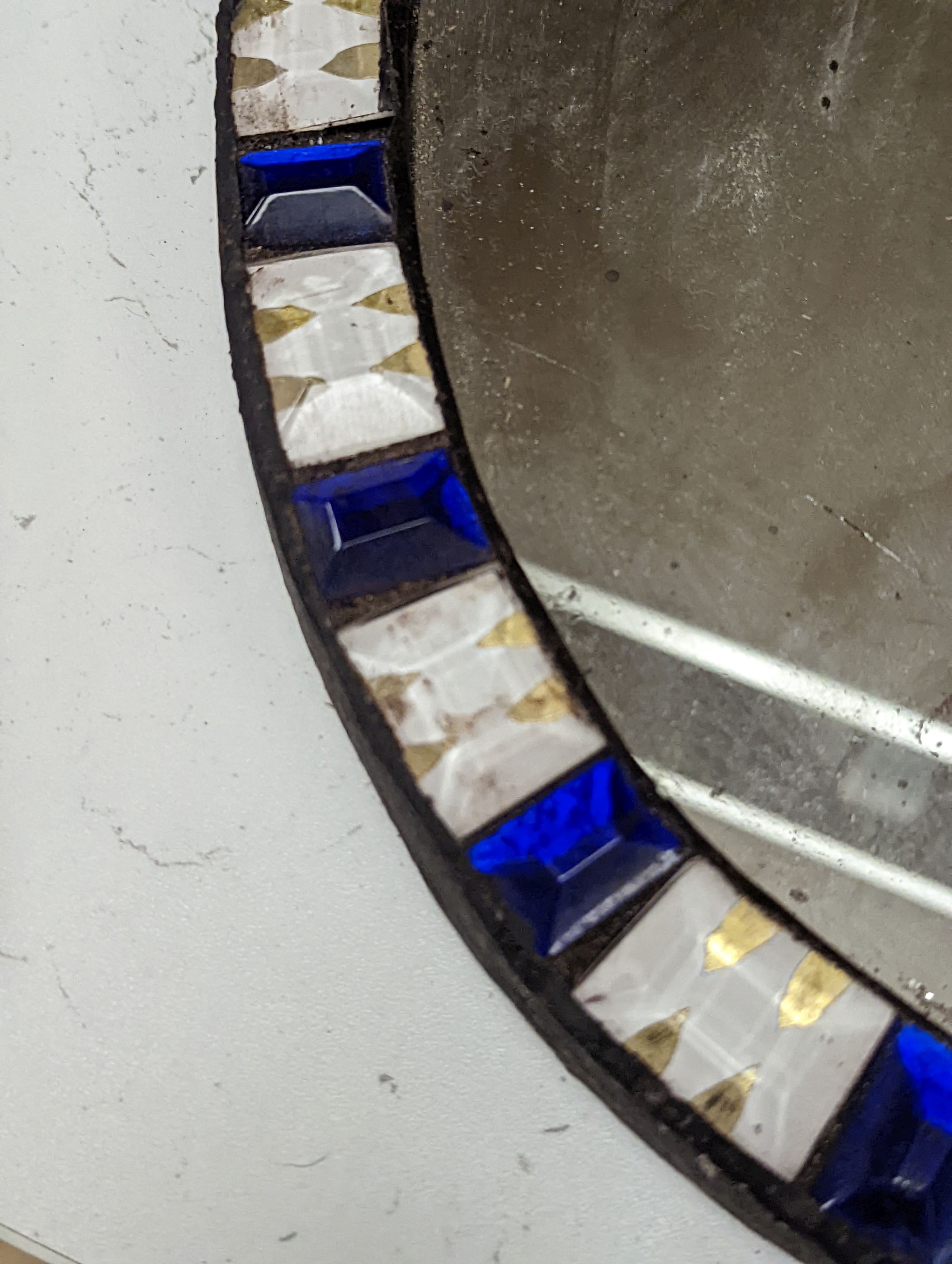 An oval Irish-style wall mirror, 56x41cm